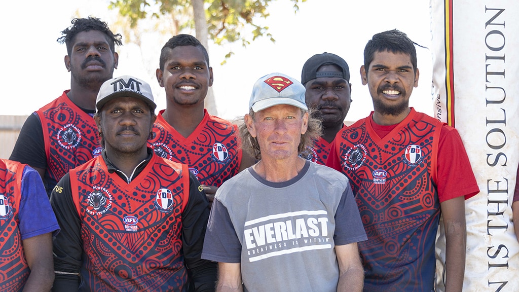 StWillJ240819KHero.jpg Stewart Willey (centre) is Youth Development Unit (YDU) Football Club's 'Superman' - AFL